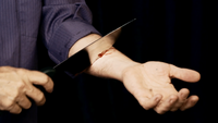 The Amazing Johnathan’s Knife Through Arm
