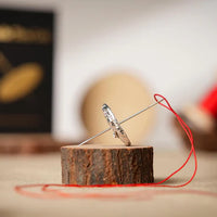 Needle Thru Coin by Nathan Kranzo and TCC Magic