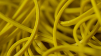 Joe Rindfleisch's SIZE 16 Rainbow Rubber Bands (Russell Leeds -Yellow ) by Joe Rindfleisch - Trick
