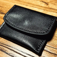 The Cowhide Coin Wallet (Black) by Bacon Magic - Trick