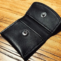 The Cowhide Coin Wallet (Black) by Bacon Magic - Trick