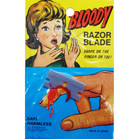 Bloody Razor Blade through Finger